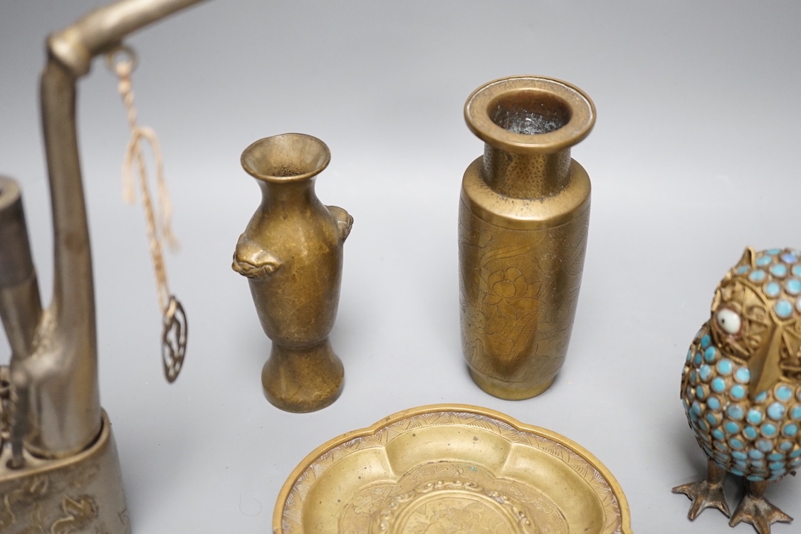 A Chinese water pipe, two Chinese bronze vases, a similar cup stand, a mask, three metal and enamel owl figures and a box